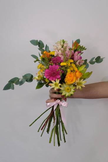 Medium Bouquet of colorful bright seasonal flowers. Wellington same day delivery florist.